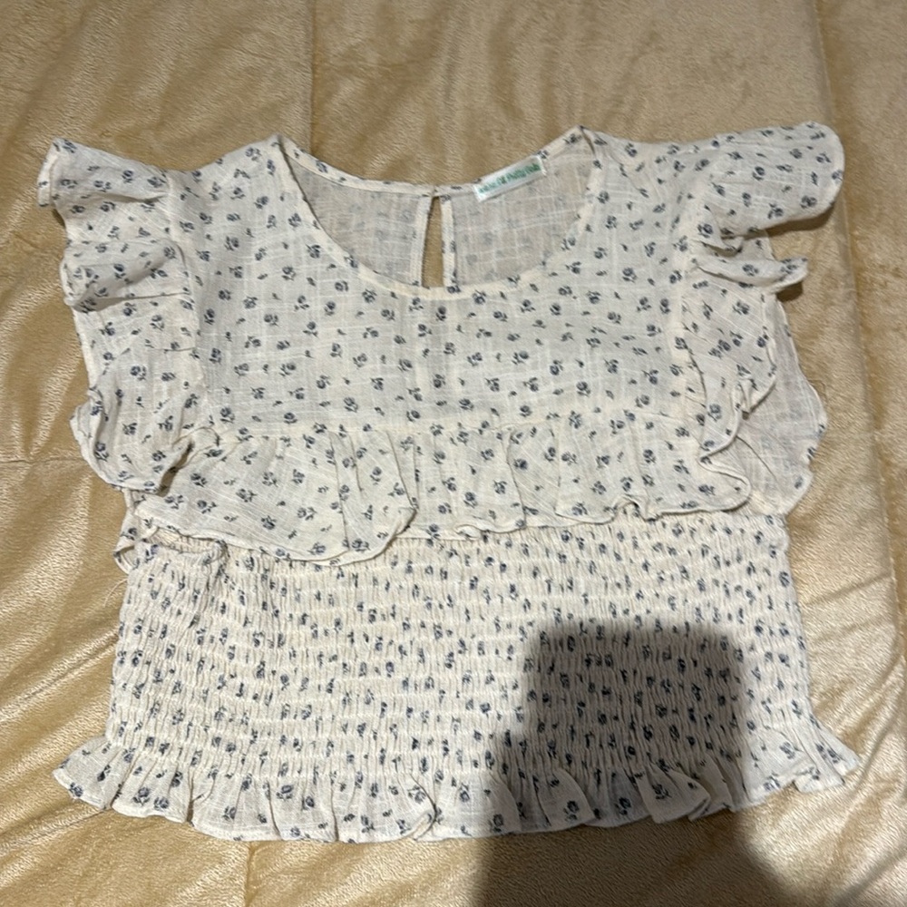 We’re all pretty girls floral top